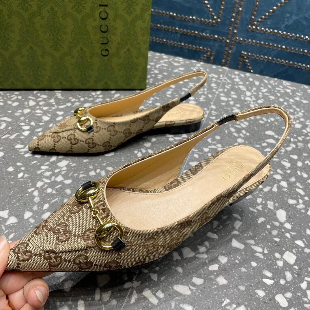 G*u*i heels