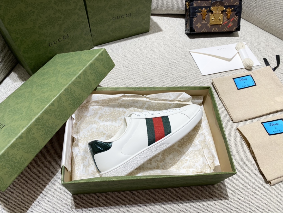 G*u*i sneakers