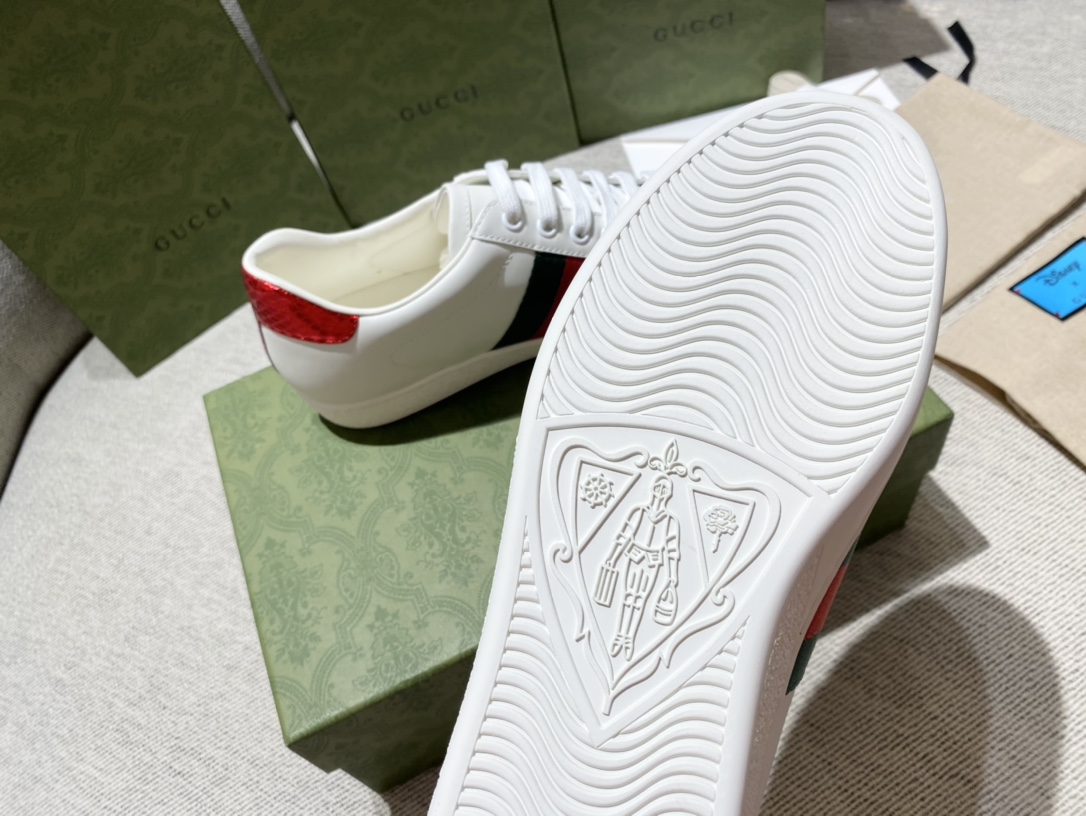 G*u*i sneakers