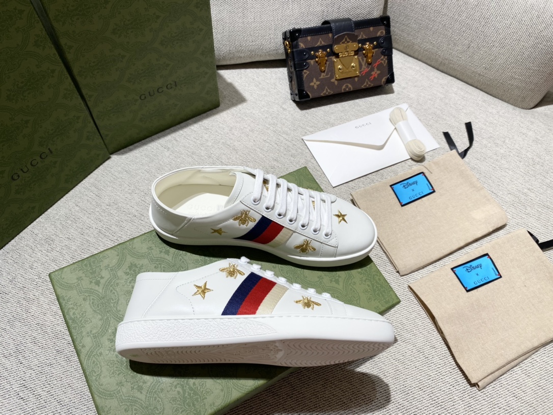 G*u*i sneakers