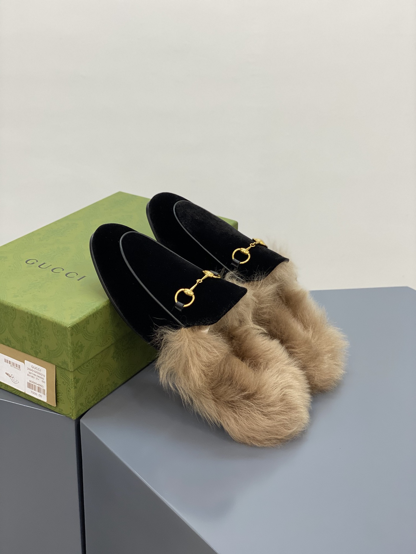 G*u*i loafers