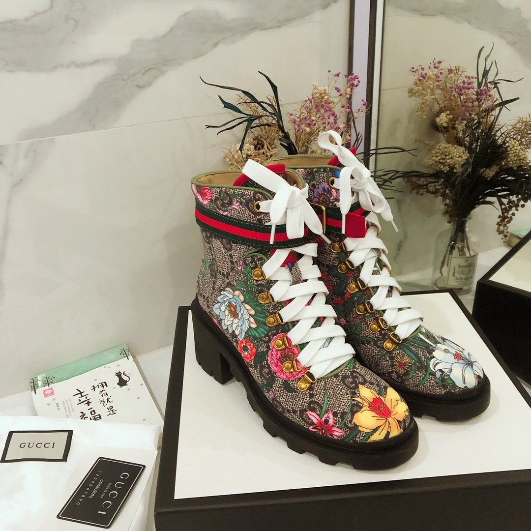 G*u*i boots