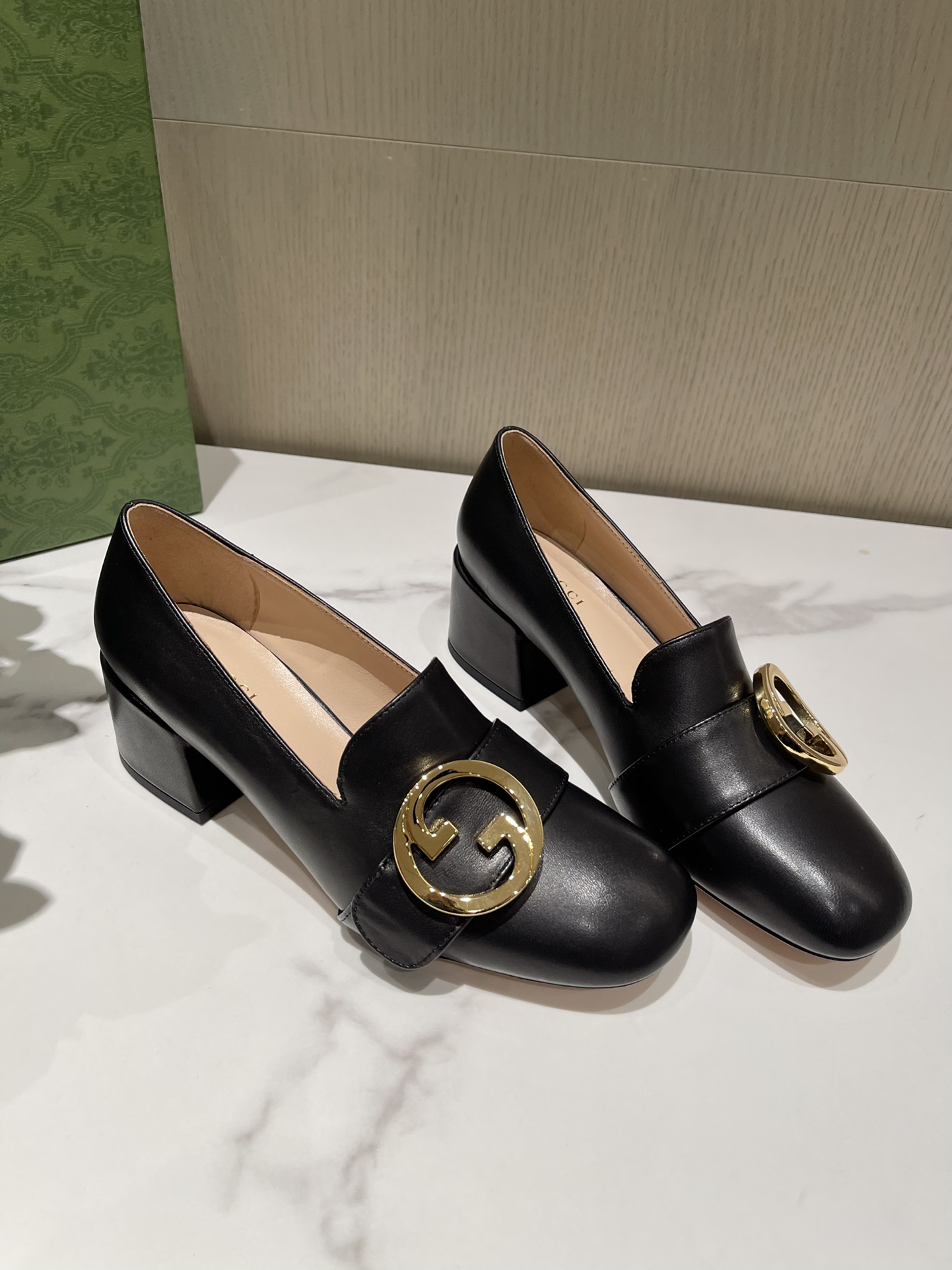 G*u*i loafers