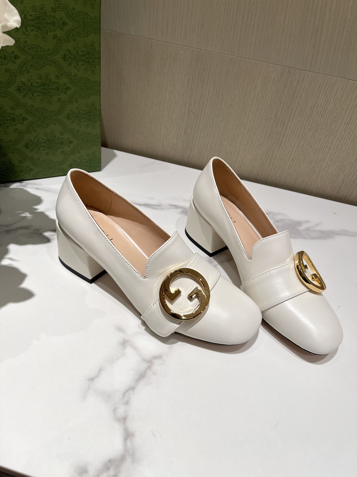 G*u*i loafers