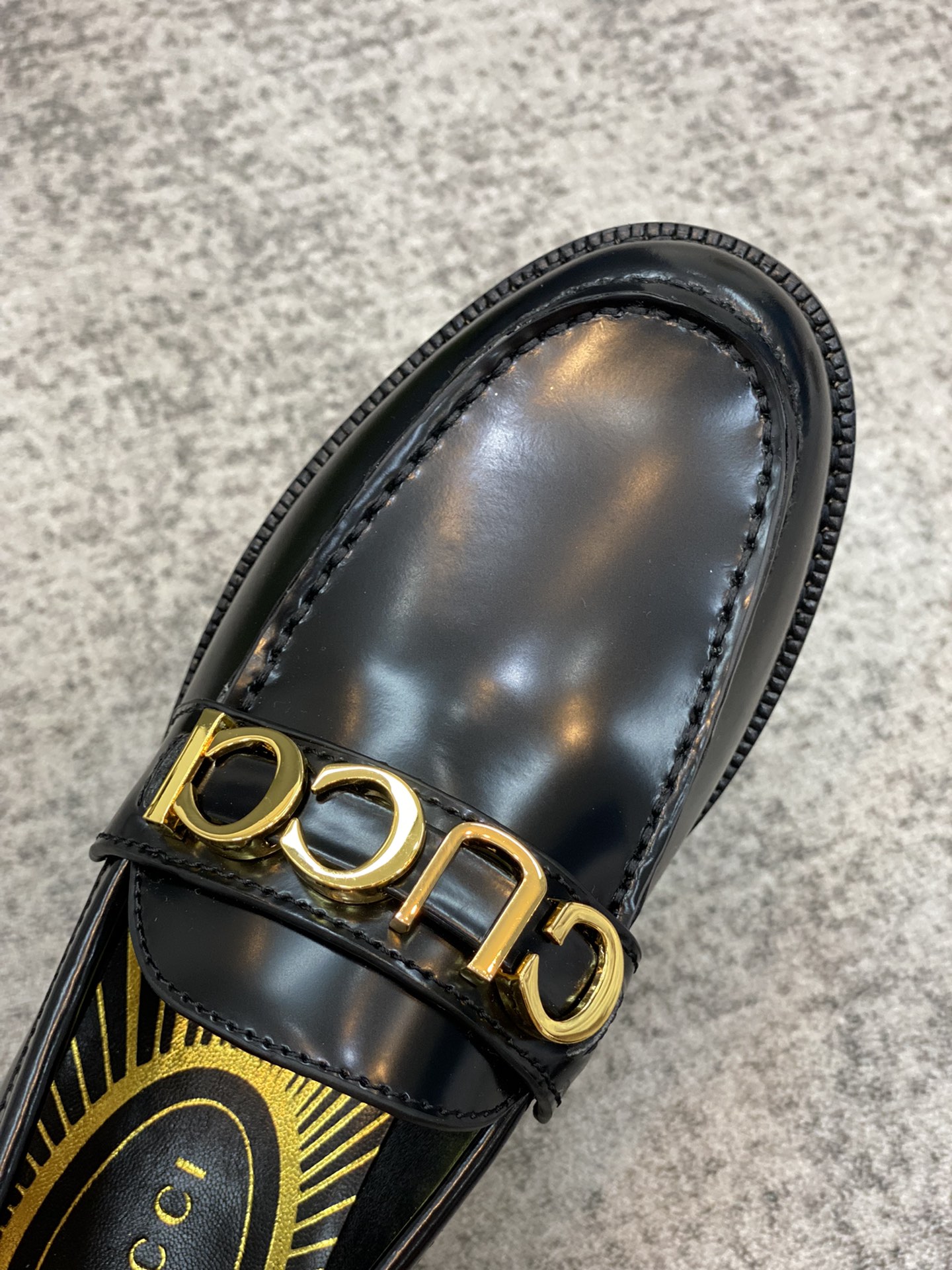 G*u*i loafers