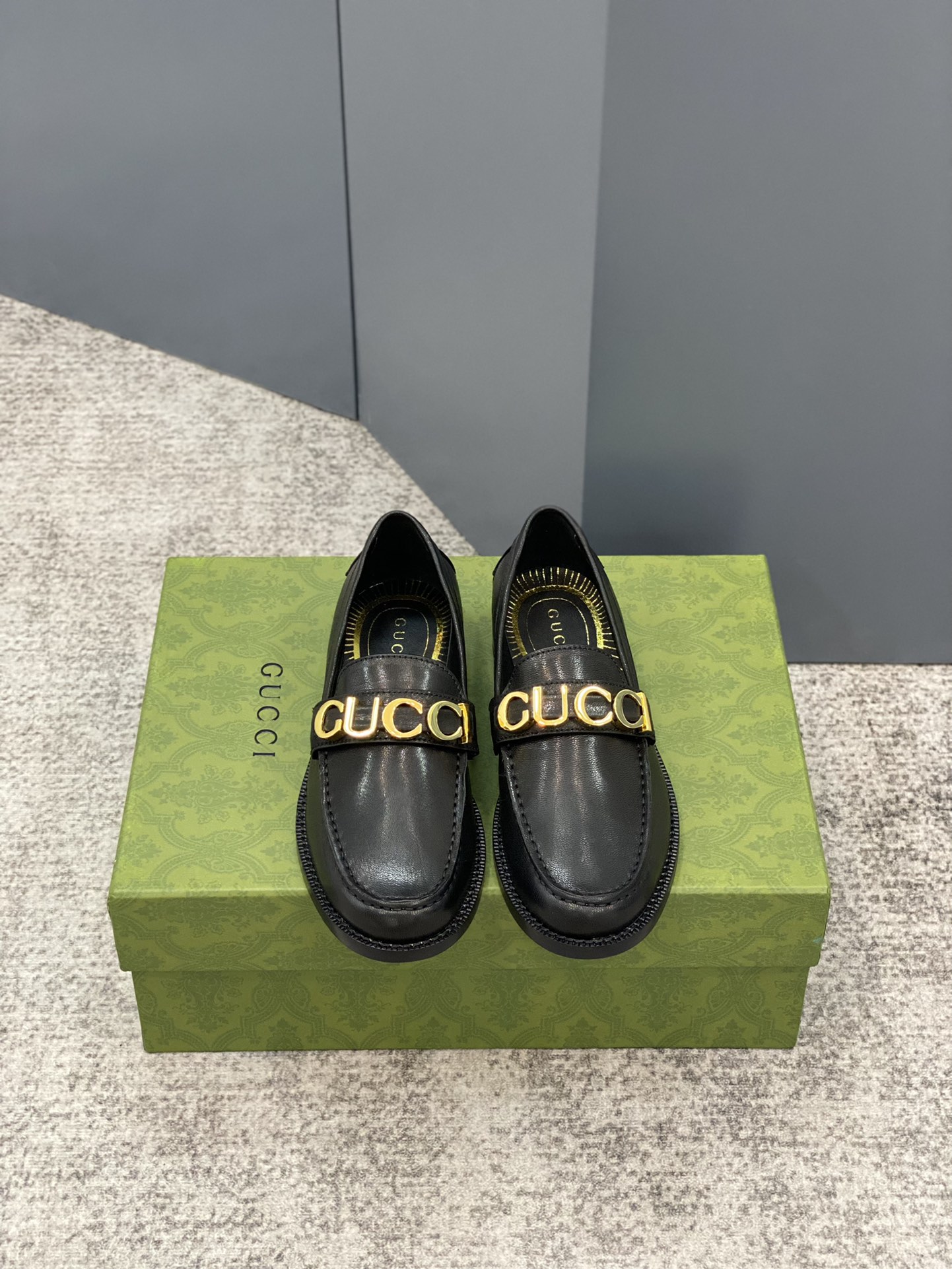G*u*i loafers