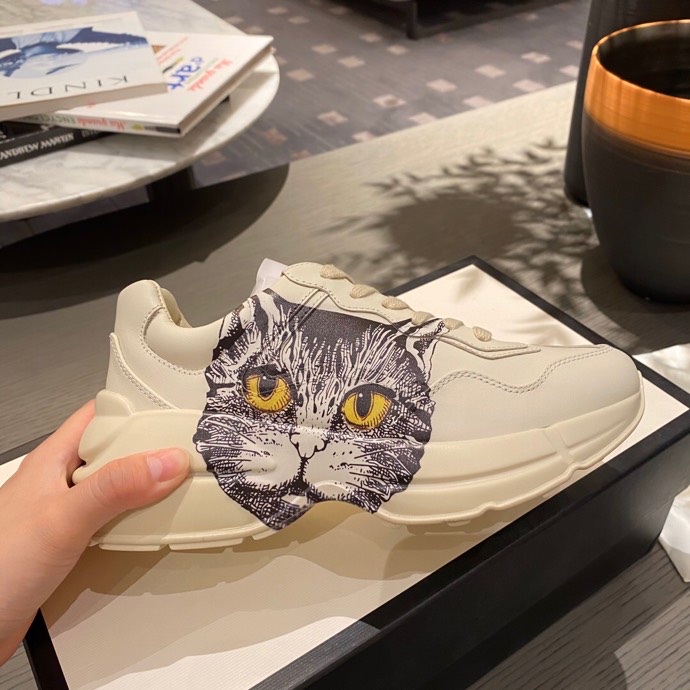 G*u*i sneakers