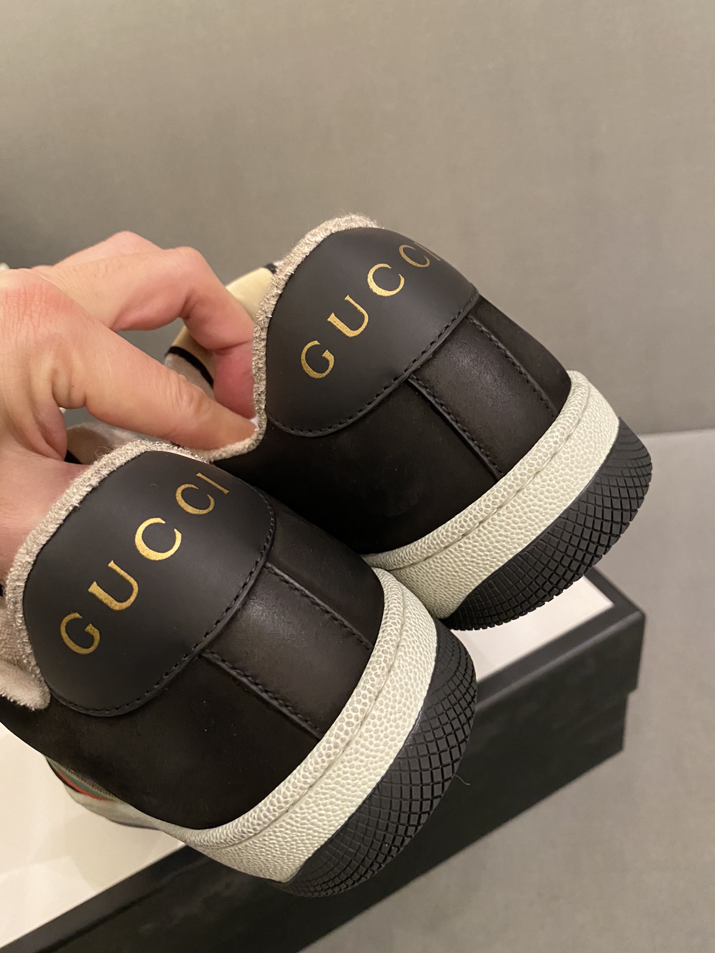 G*u*i sneakers