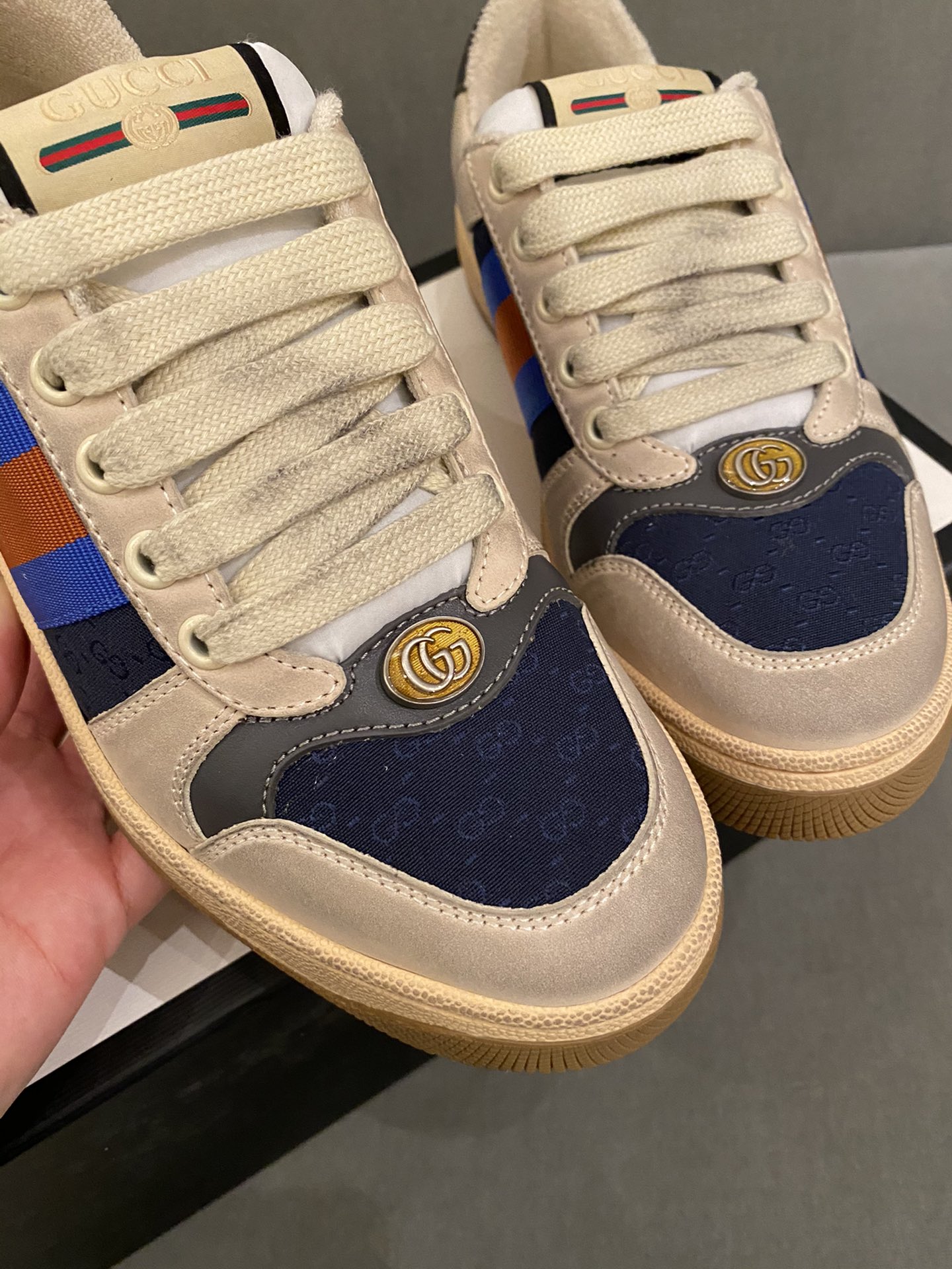 G*u*i sneakers