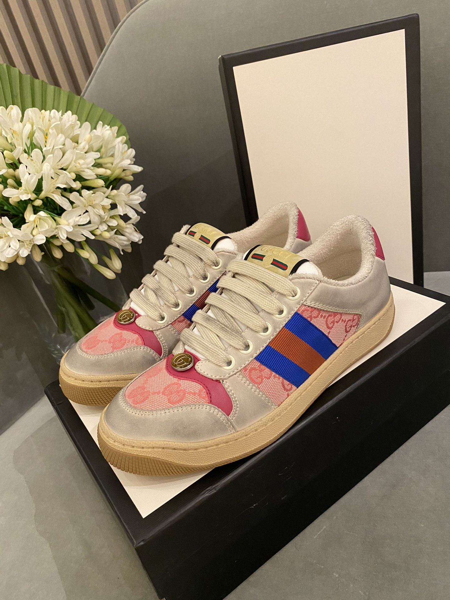 G*u*i sneakers