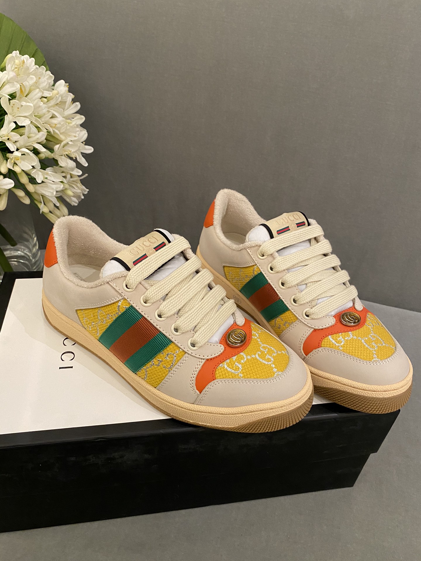 G*u*i sneakers