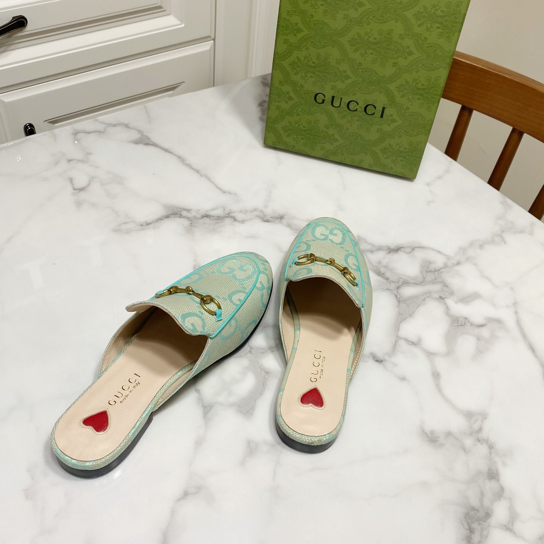 G*u*i loafers