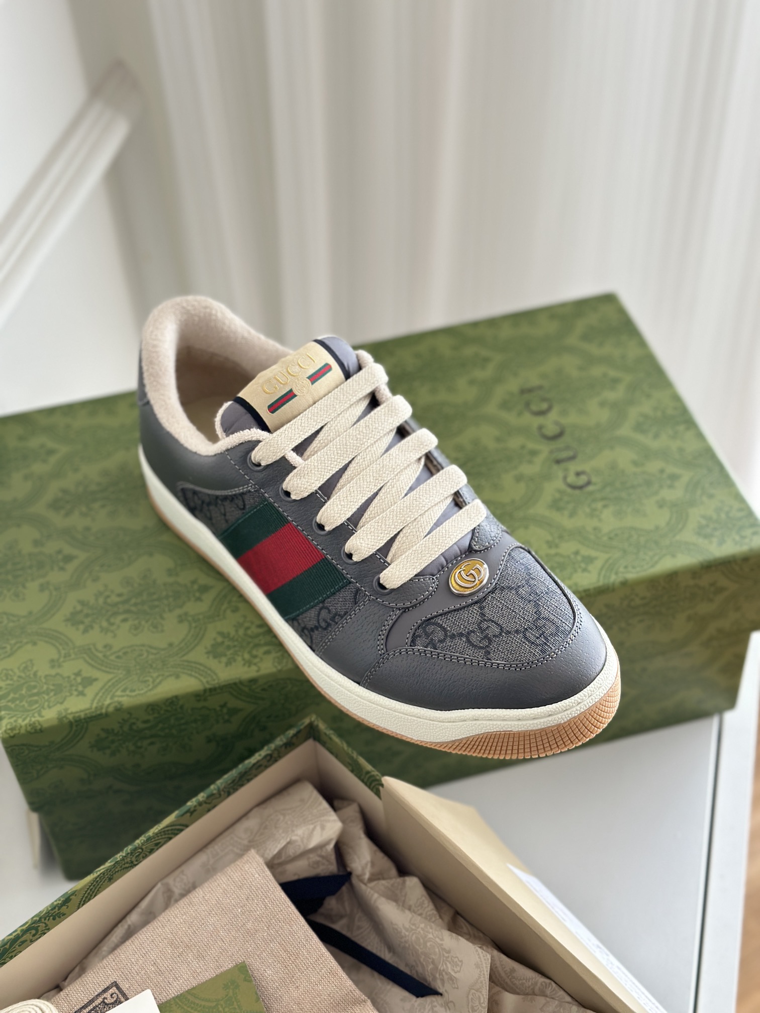 G*u*i sneakers