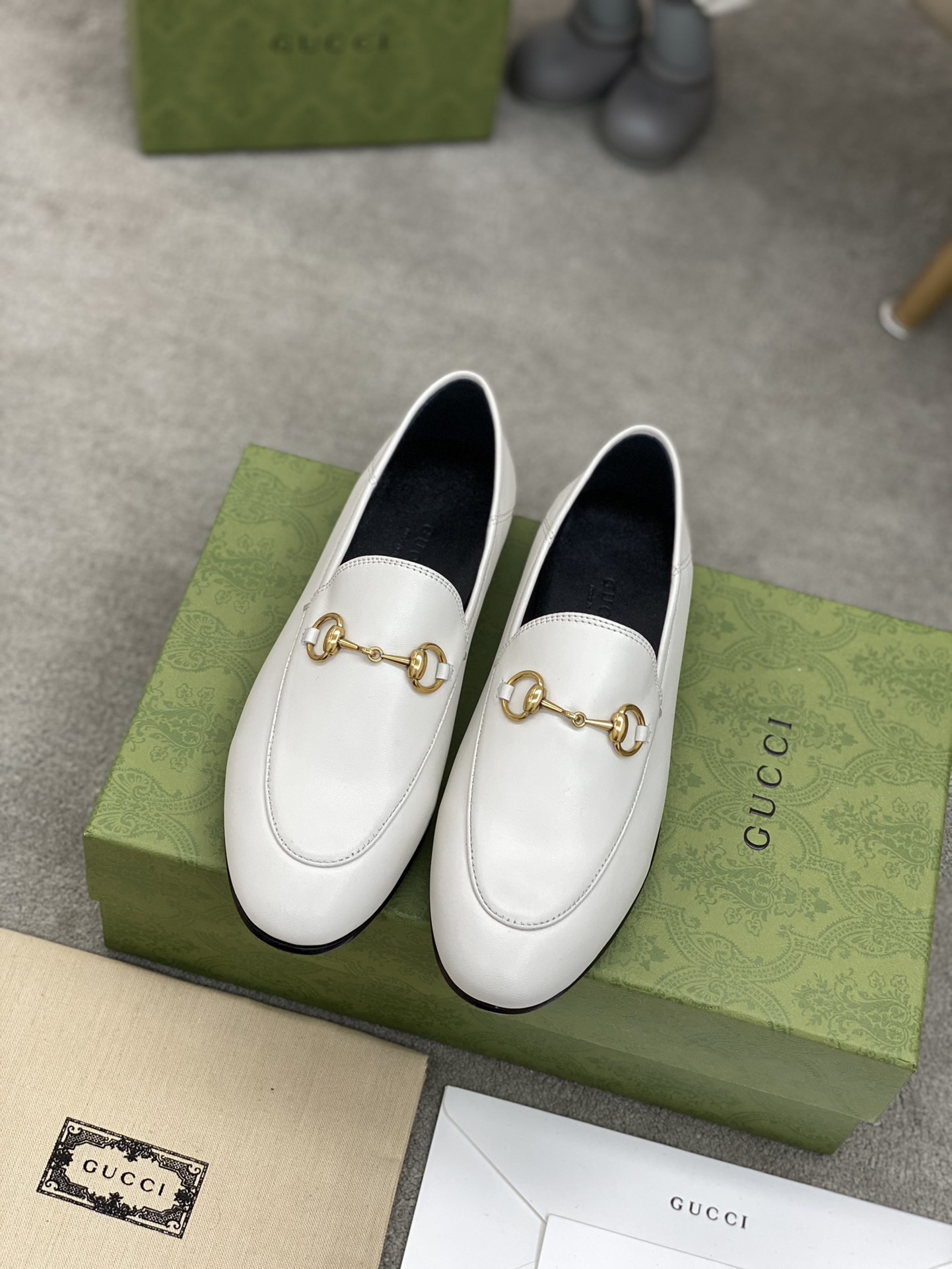 G*u*i loafers