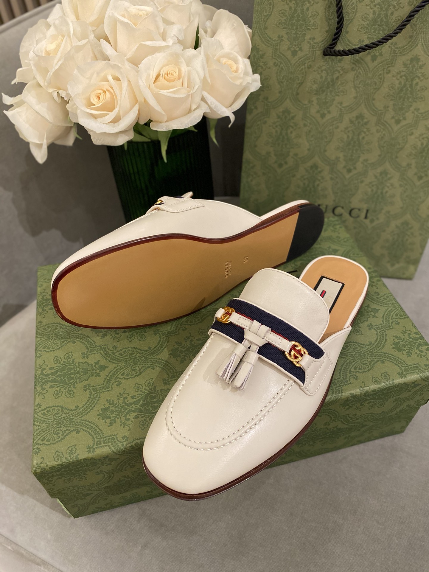 G*u*i loafers
